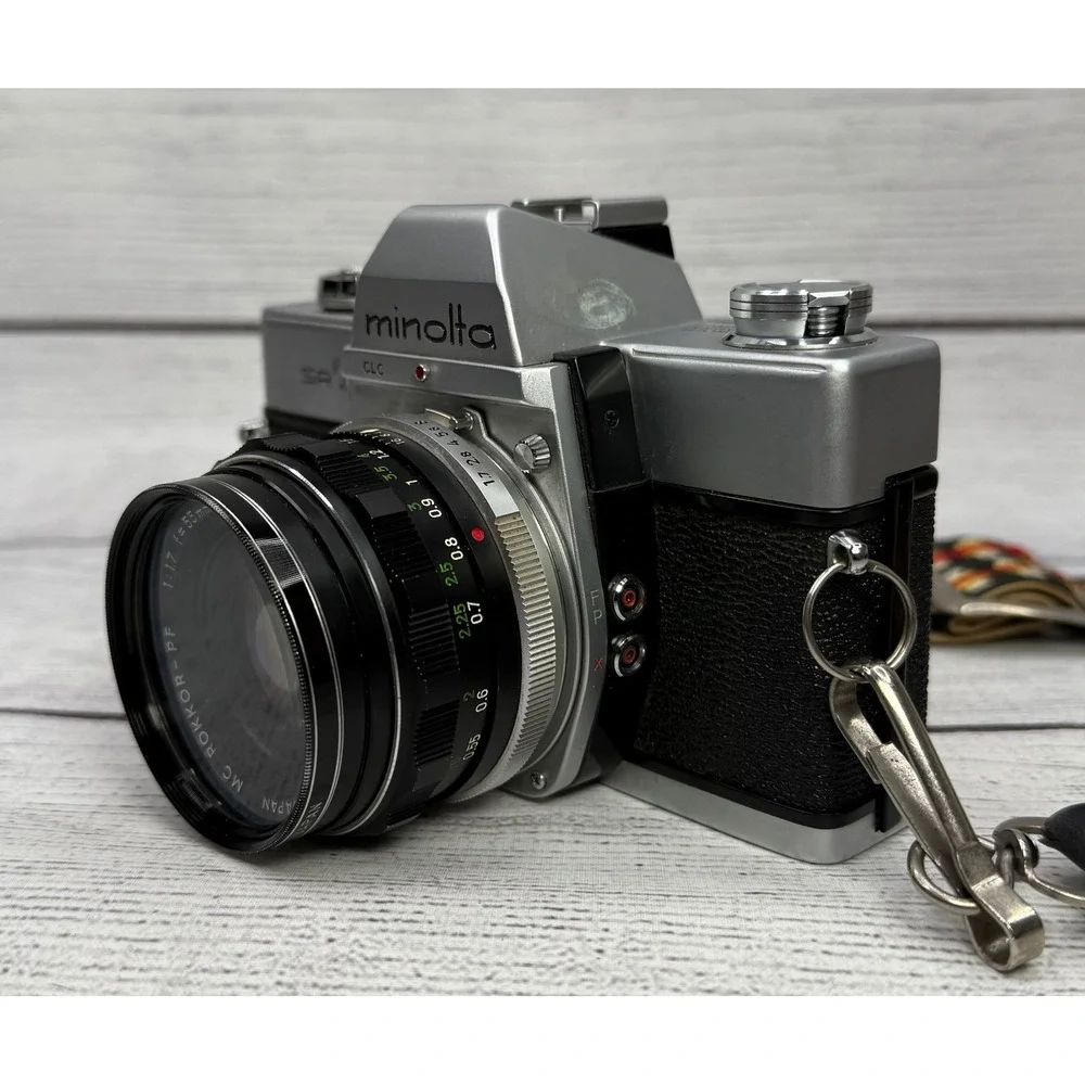 Minolta SRT‎ 101 35mm SLR Film Camera with MC Rokkor-PF 55mm f1.7 Lens Silver